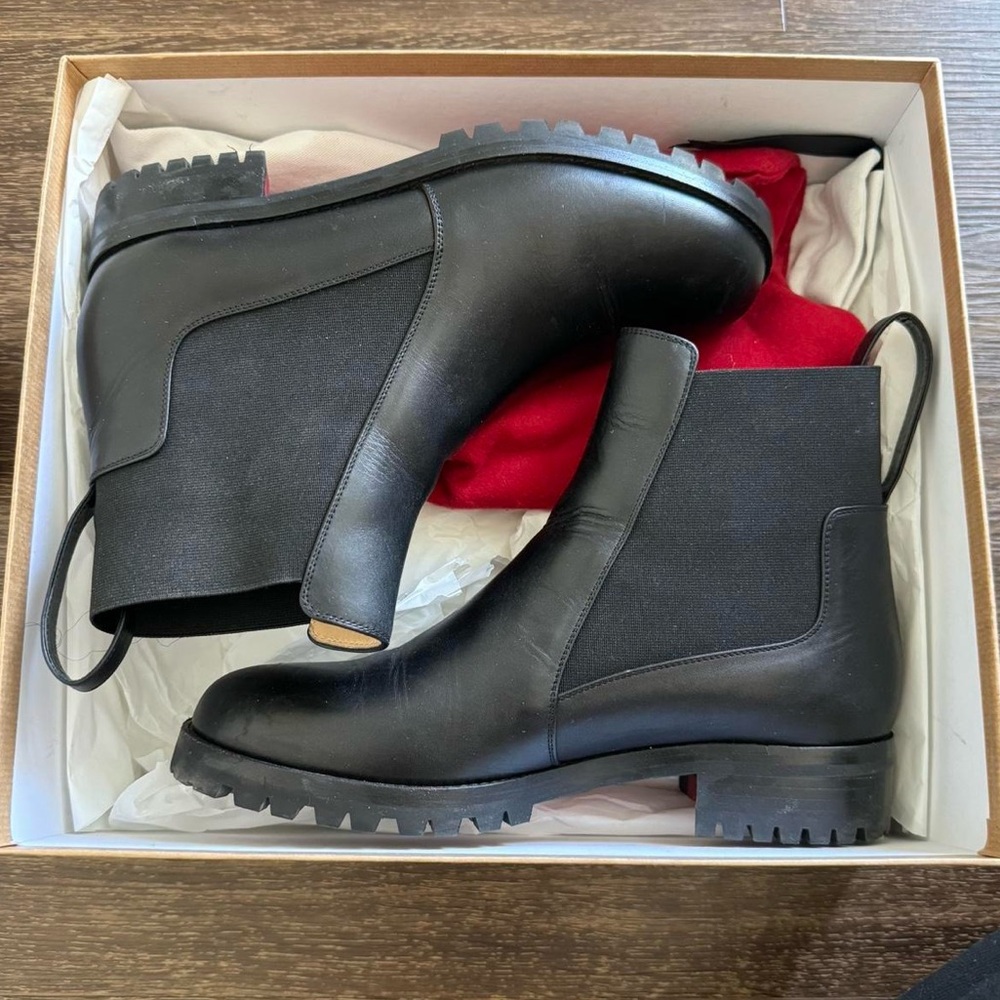 Christian Louboutin marchacroche booties.